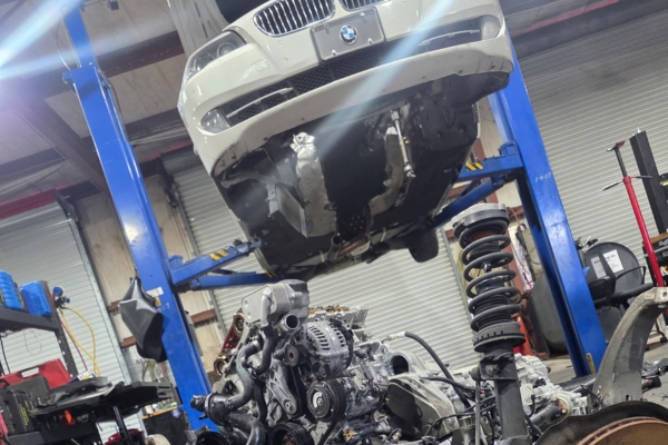 Image: BMW Repair Winter Haven. Engine out of the car, Car on lift